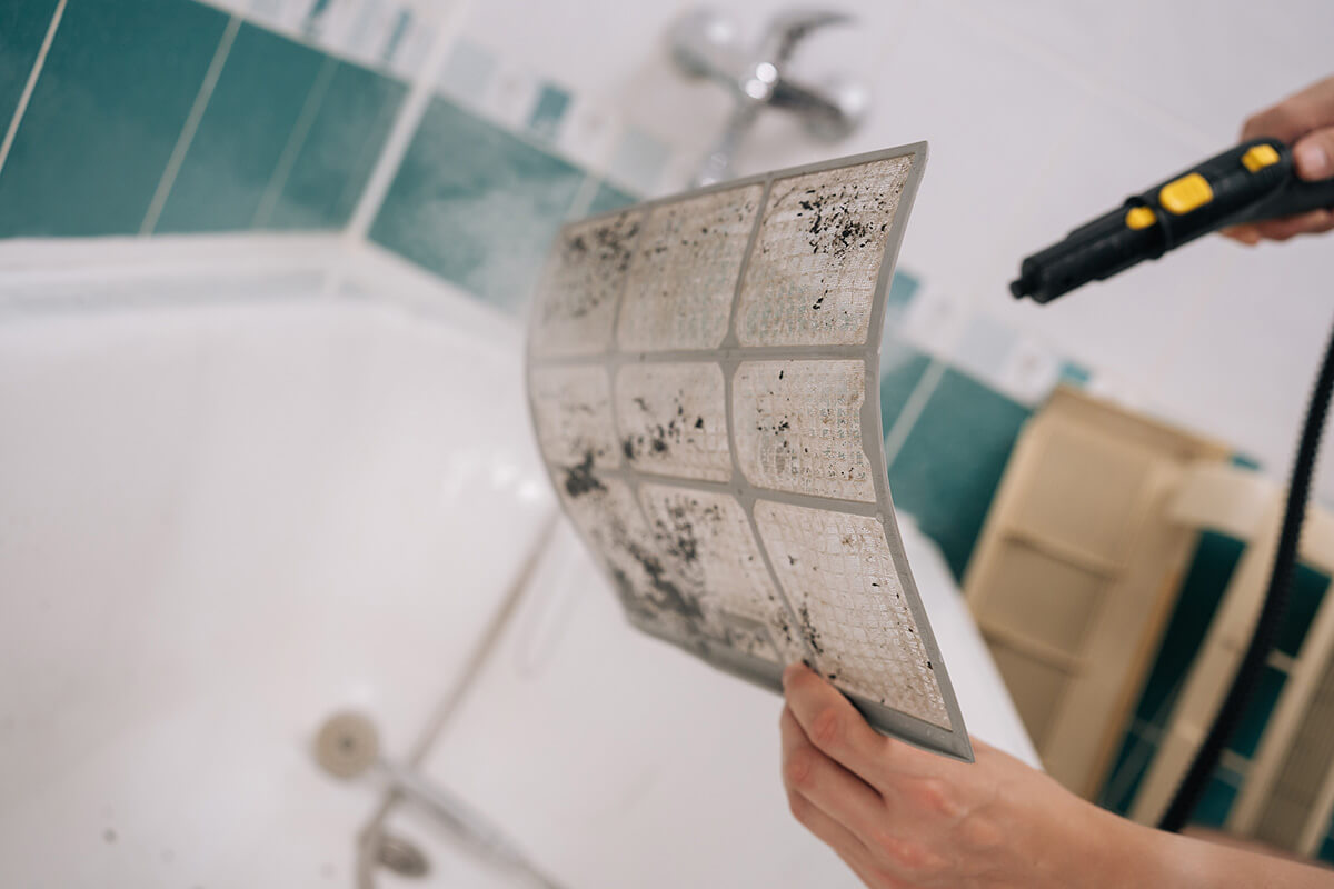 using vacuum cleaner to remove dust and dirt